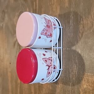 2 small canister in wire rack